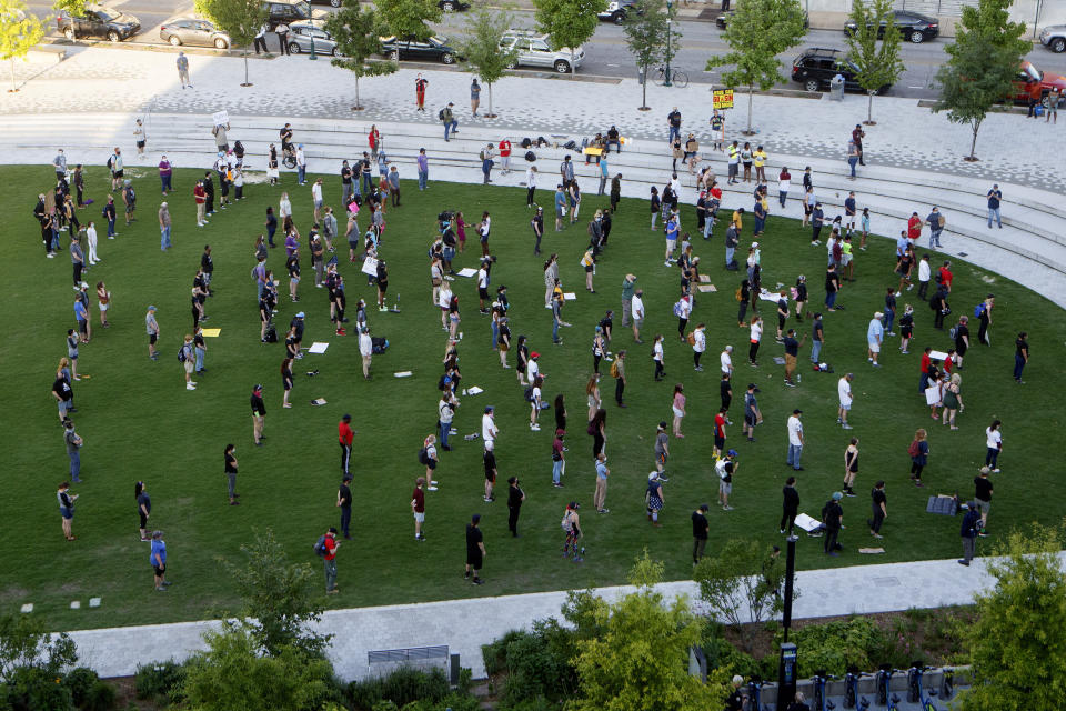 Protesters take part in a socially distanced breathing exercise at Miller Park Chattanooga, Tennessee, on June 1. (Photo: C.B. Schmelter/Chattanooga Times Free Press via Associated Press)