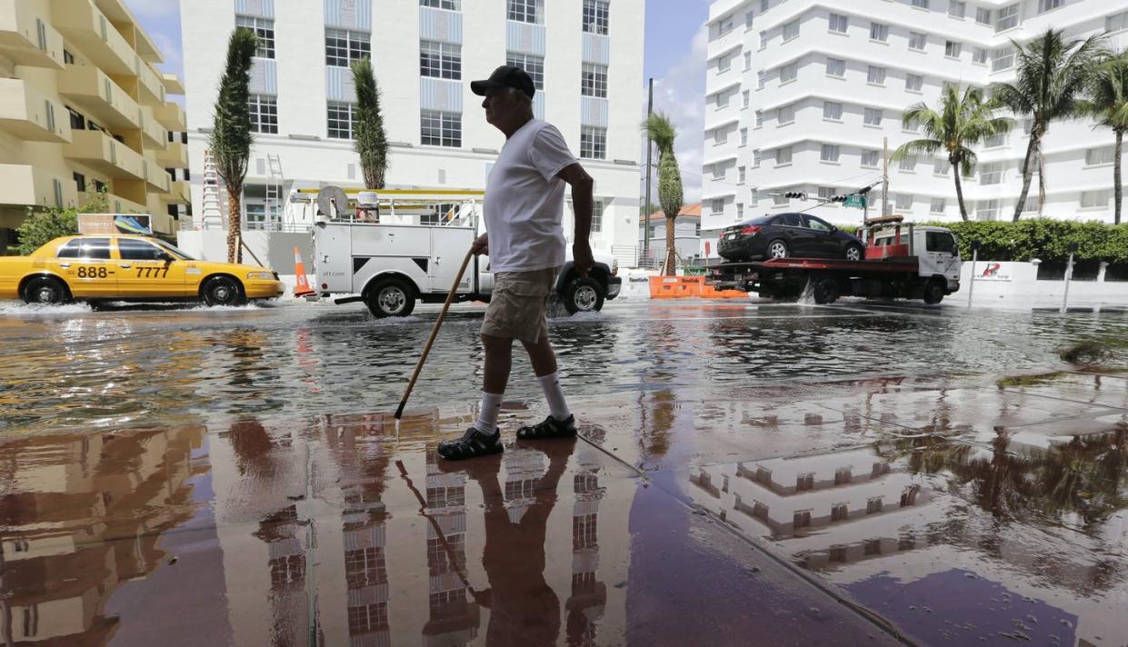 <span class="caption">High-tide flooding has become a frequent problem in the Miami area.</span> <span class="attribution"><a class="link " href="https://newsroom.ap.org/detail/Election2020MiamiClimate/2bd7902902d64faa9857020e7dc84d9b/photo" rel="nofollow noopener" target="_blank" data-ylk="slk:AP Photo/Lynne Sladky;elm:context_link;itc:0;sec:content-canvas">AP Photo/Lynne Sladky</a></span>