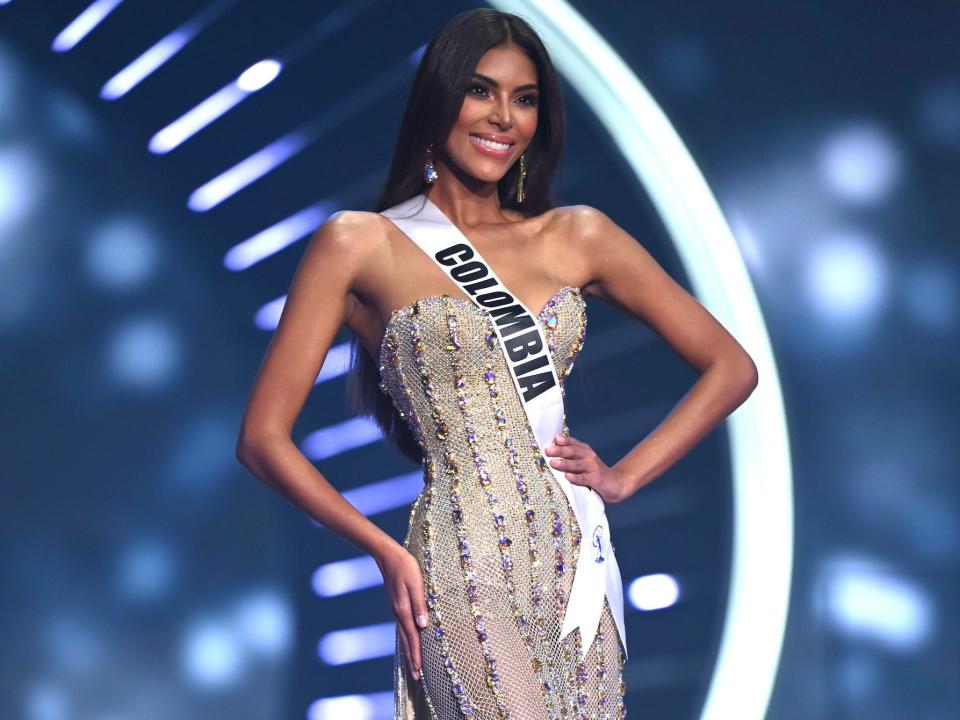 Miss Colombia poses in an evening gown at the 2021 Miss Universe competition.