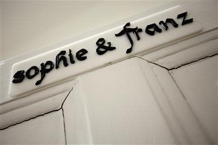 The nameplate of a room is seen at a door of the Franz Ferdinand hostel in Sarajevo, January 29, 2014. REUTERS/Dado Ruvic