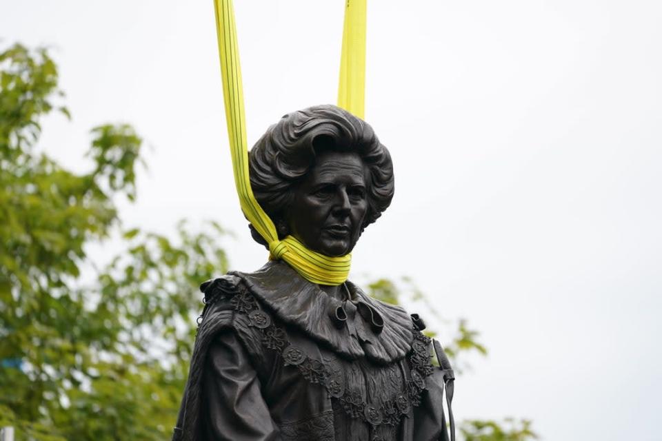 A statue of Baroness Margaret Thatcher is lowered into place in her home town of Grantham, Lincolnshire. Picture date: Sunday May 15, 2022. (PA Wire)