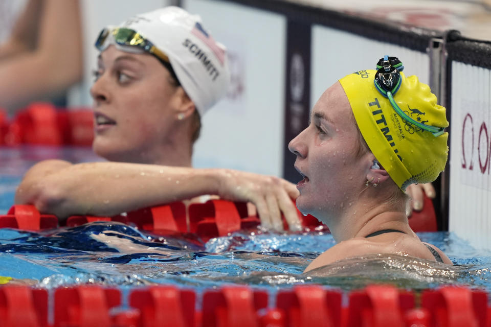 Ariarne Titmus of Australia rests after her heat in the women's 200-meter freestyle at the 2020 Summer Olympics, Monday, July 26, 2021, in Tokyo, Japan. (AP Photo/Martin Meissner)