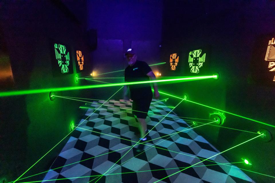 Kimberly Sprague, owner of the Emerald Coast Mirror Maze & Laser Craze, says the remodeled attraction is almost complete but still a work in progress, noting that she wants to add an infinity mirror hallway, more arcade games, and a prize redemption counter.