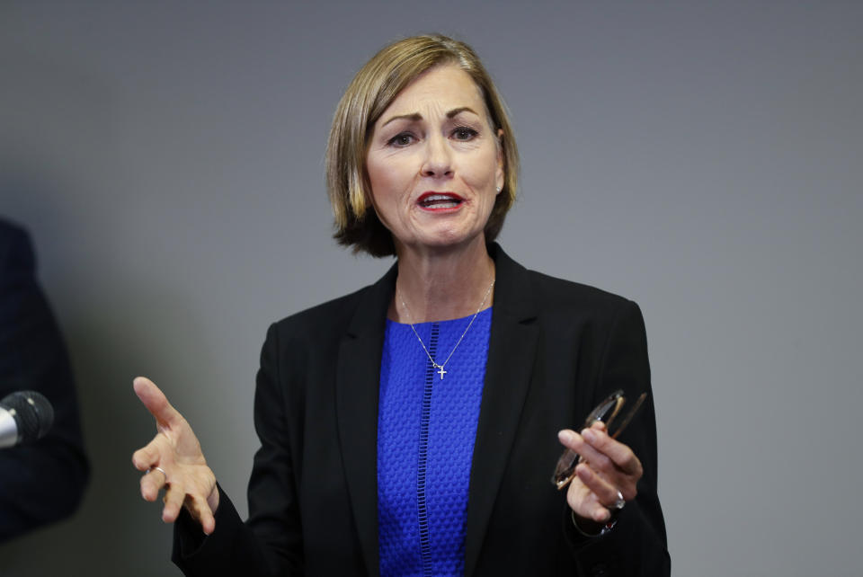 FILE - Iowa Gov. Kim Reynolds speaks during a news conference, July 7, 2020, in Urbandale, Iowa. Iowa's state auditor Rob Sand on Tuesday, March 1, 2022, again called for Gov. Kim Reynolds to return nearly $450,000 in federal coronavirus relief funds that were used to pay for 21 governor's office staff members for three months in 2020. (AP Photo/Charlie Neibergall, File)