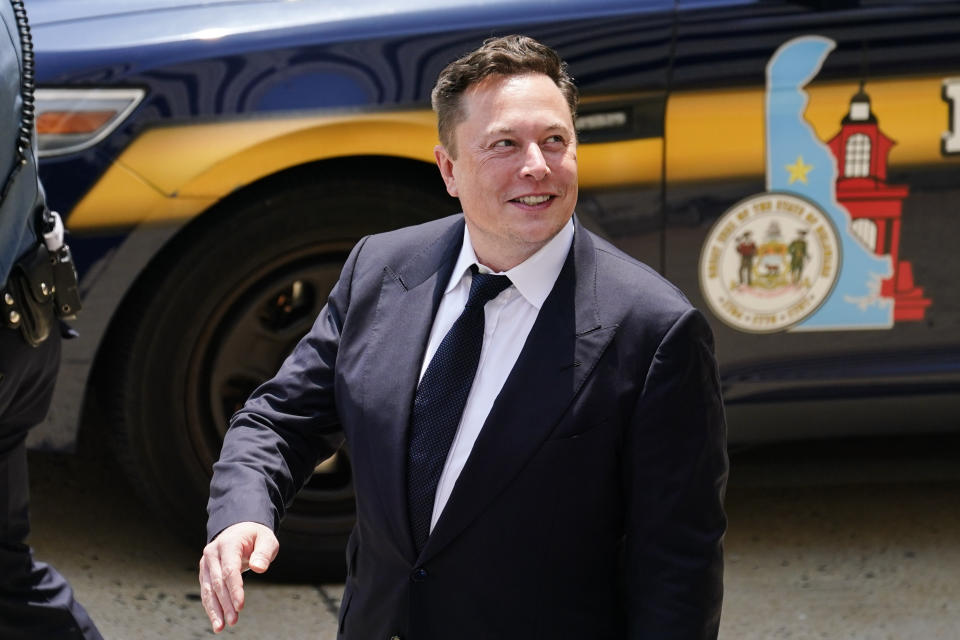 FILE - CEO Elon Musk departs from the justice center in Wilmington, Del., on July 13, 2021. Entrepreneur Elon Musk is helping reconnect Tonga to the internet after a volcanic eruption and tsunami cut off the South Pacific nation more than three weeks ago, according to officials, while repairs on an undersea cable are proving more difficult than first thought.(AP Photo/Matt Rourke, File)