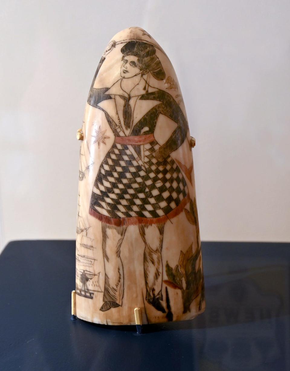 A carving of an infamous woman pirate, Alwilda, is part of the scrimshaw exhibit at the Cahoon Museum of American Art.