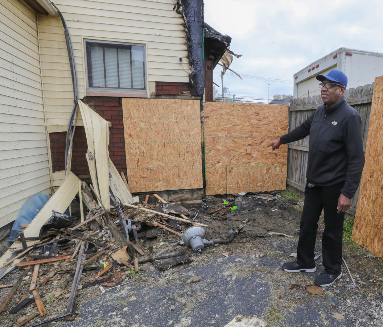 Ward 5 Akron City Councilman Johnnie Hannah talks Thursday about the Monday morning fire that heavily damaged his East South Street home.
