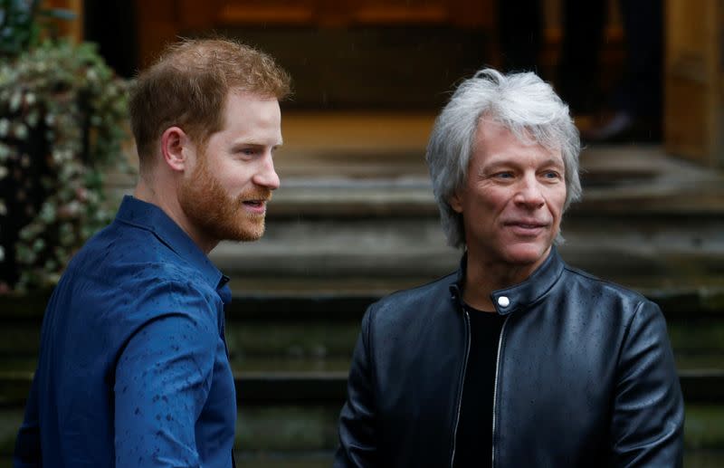 Britain's Prince Harry meets Jon Bon Jovi and members of the Invictus Games Choir in London
