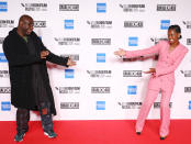 <p>Steve McQueen and Letitia Wright show each other love at the premiere of <em>Mangrove,</em> during the opening night screening of the 64th BFI London Film Festival, on Wednesday in London.</p>