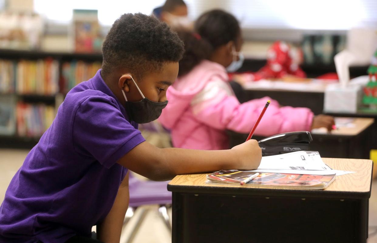 Christian Woods, 9, works in his 4th grade class at Graham Elementary School in this Star file photo.