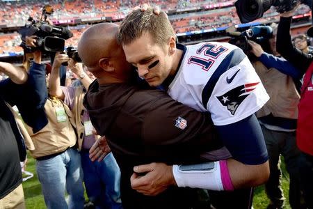 Oct 9, 2016; Cleveland, OH, USA; Cleveland Browns head coach Hue Jackson and New England Patriots quarterback Tom Brady (12) meet after the game at FirstEnergy Stadium. Mandatory Credit: Ken Blaze-USA TODAY Sports