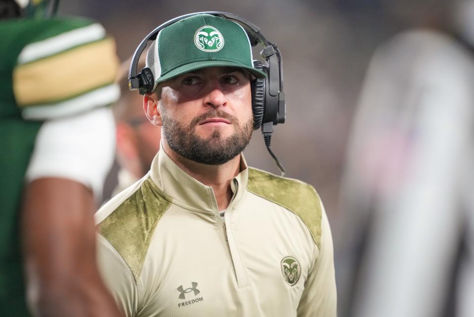 Nov 11, 2023; Fort Collins, Colorado, USA; Colorado State Rams assistant coach - wide receivers Chad Savage talks to his team during the second quarter against the San Diego State Aztecs at Sonny Lubick Field at Canvas Stadium. Mandatory Credit: Andrew Wevers-USA TODAY Sports