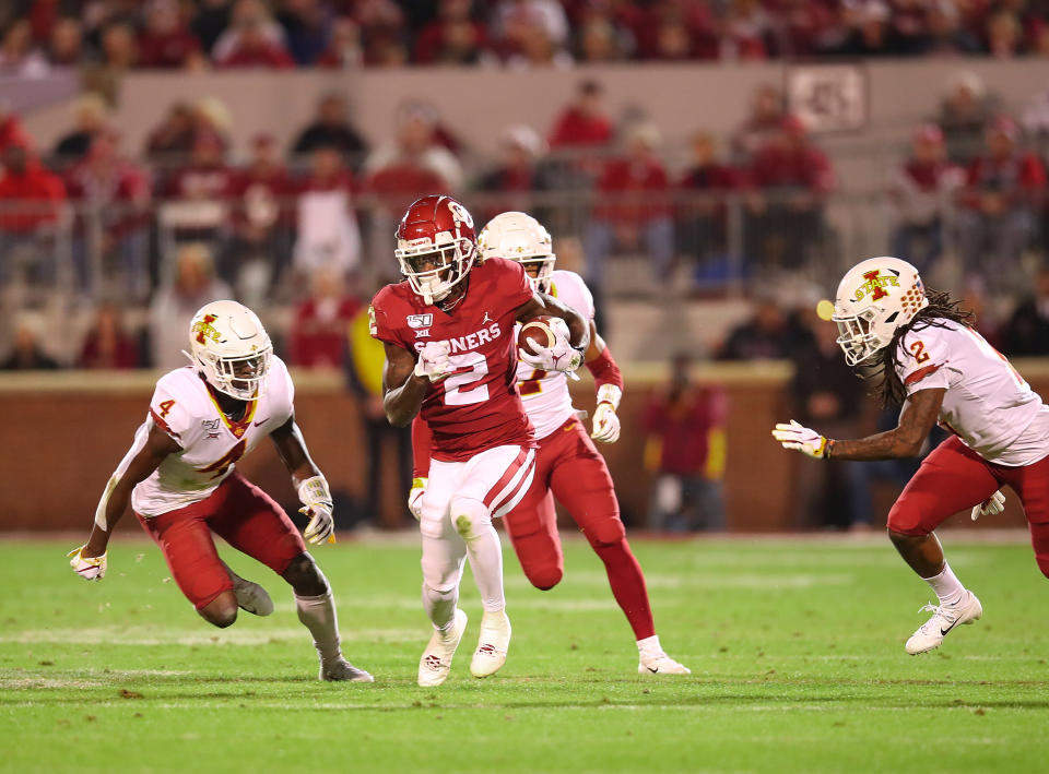 NORMAN, OK - NOVEMBER 09: Oklahoma Sooners WR Ceedee Lamb  (2) out runs the defenders for a big gain during a college football game between the Oklahoma Sooners and the Iowa State Cyclones on November 9, 2019, at Memorial Stadium in Norman, OK.  (Photo by David Stacy/Icon Sportswire via Getty Images)