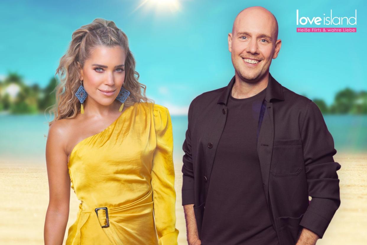 Big News: Der Musiker und Moderator Oli.P wird künftig als Co-Host von Sylvie Meis bei "Love Island" zu sehen sein. Die Datingshow soll laut RTLZWEI "interaktiver denn je" werden. Denn montags gehen die beiden Moderatoren live auf Sendung und beziehen die Zuschauerinnen und Zuschauer per App mit ein. (Bild: RTLZWEI/Schweigert/Possert)