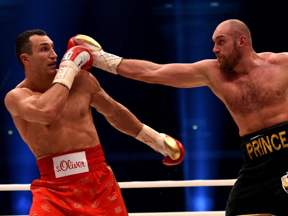 Wladimir Klitschko and Tyson Fury fighting in 2015 (AFP/Getty)