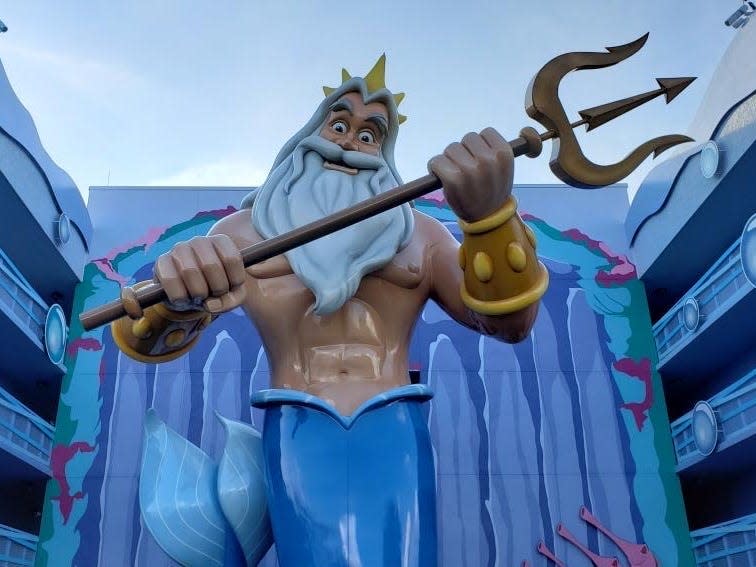 king triton statue at disney's art of animation resort 