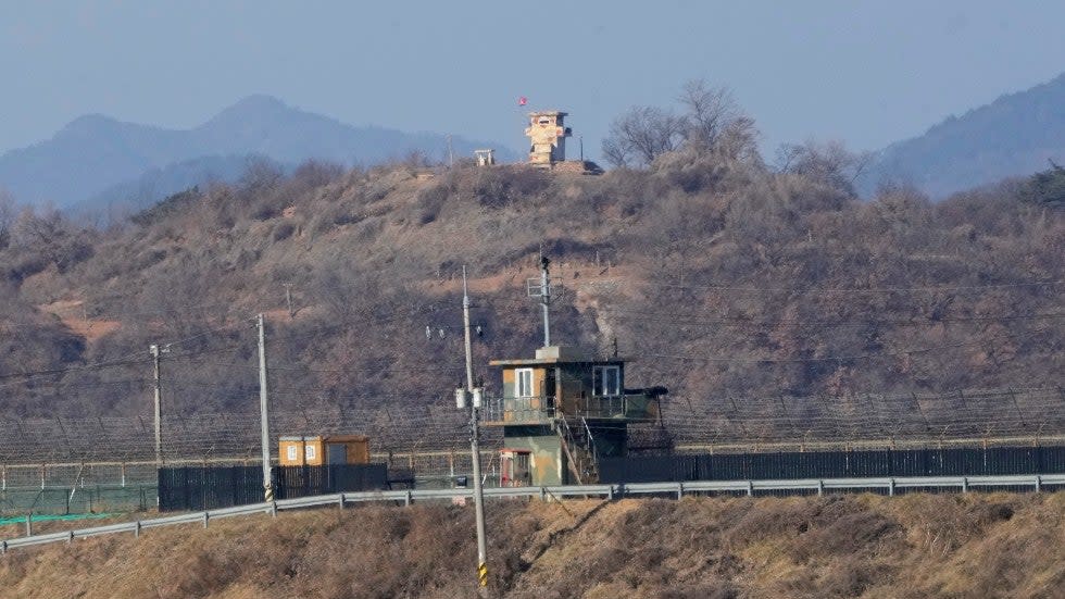 Military guard posts of North Korea, rear, and South Korea, front, are seen in Paju, near the border with North Korea, South Korea