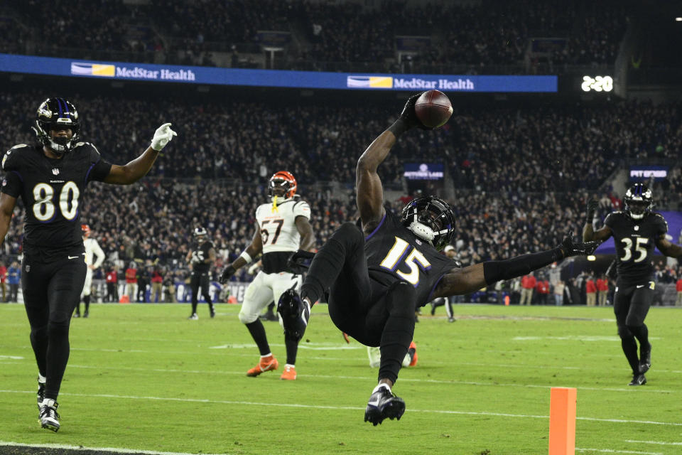 Baltimore Ravens wide receiver Nelson Agholor (15) scores a touchdown in the first half of an NFL football game against the Cincinnati Bengals in Baltimore, Thursday, Nov. 16, 2023. (AP Photo/Nick Wass)