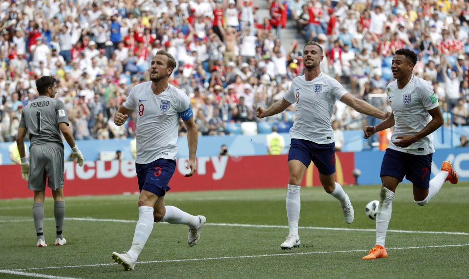 <p>England’s Harry Kane, second from left, celebrates with his teammates Harry Kane, second from right, and Jesse Lingard </p>