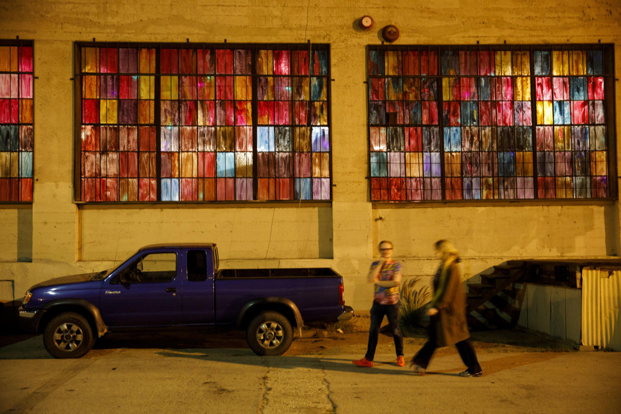 Pedestrians walk past the 356 Mission art gallery in Boyle Heights. (Photo: Patrick T. Fallon for Yahoo News)