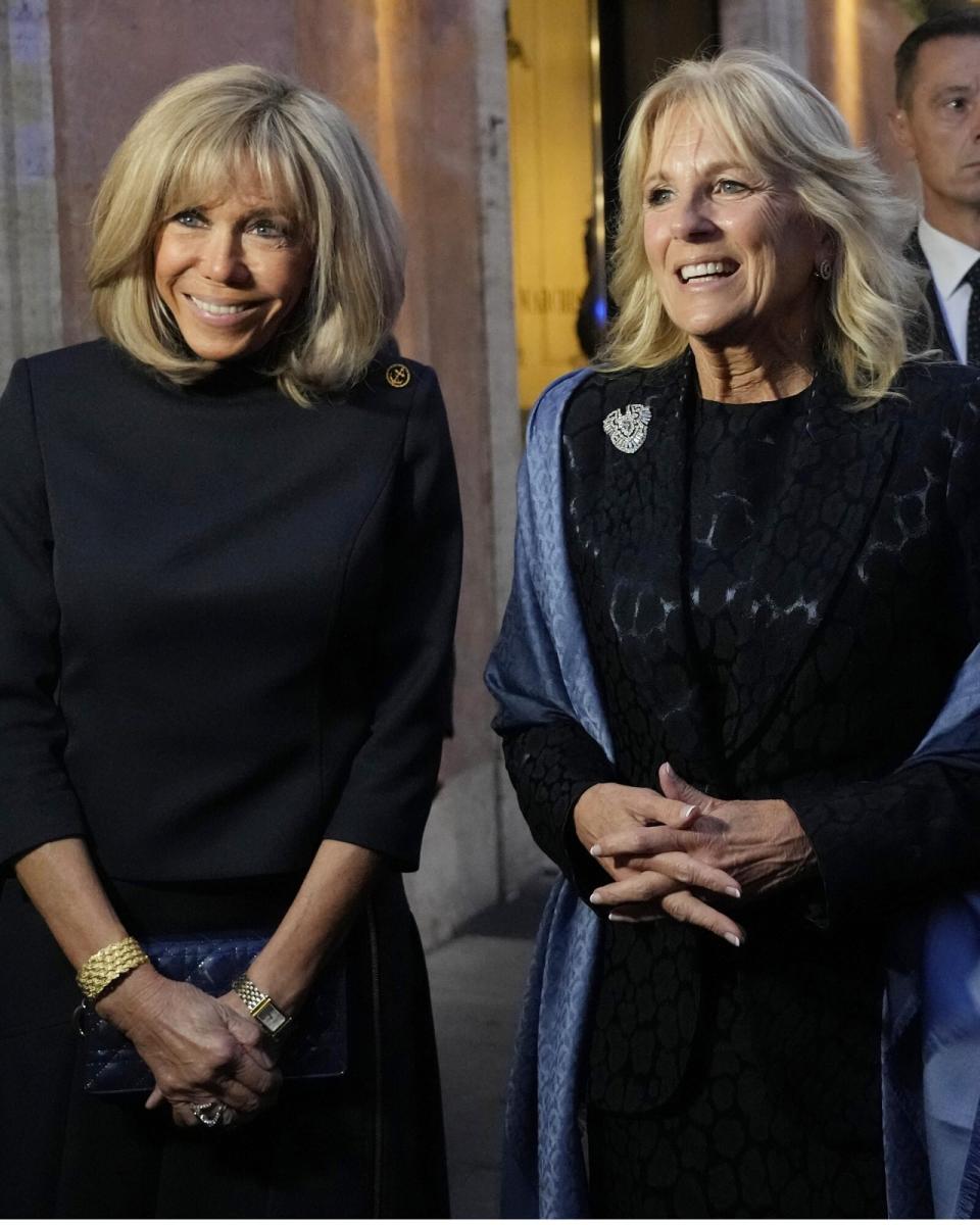 First lady Jill Biden, right, and French first lady Brigitte Macron, left, speak outside of a restaurant on the sidelines of an upcoming G20 summit in Rome, . A Group of 20 summit scheduled for this weekend in Rome is the first in-person gathering of leaders of the world's biggest economies since the COVID-19 pandemic started G20 Summit, Rome, Italy - 29 Oct 2021
