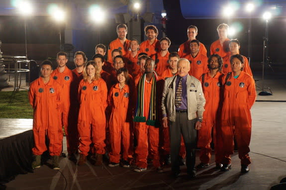 The 23 future Lynx travelers pose with moonwalker Buzz Aldrin after they were announced the winners of the AXE Apollo Space Academy. Image uploaded Dec. 5, 2013.