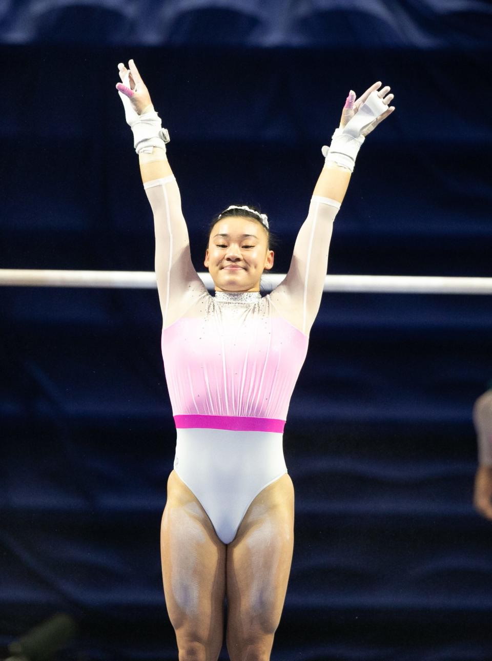 Florida Gators gymnast Leanne Wong finishes a perfect routine as Florida takes on Arkansas in an NCAA Gymnastics meet at Exactech Arena in Gainesville, FL on Friday, February 9, 2024. [Alan Youngblood/Gainesville Sun]