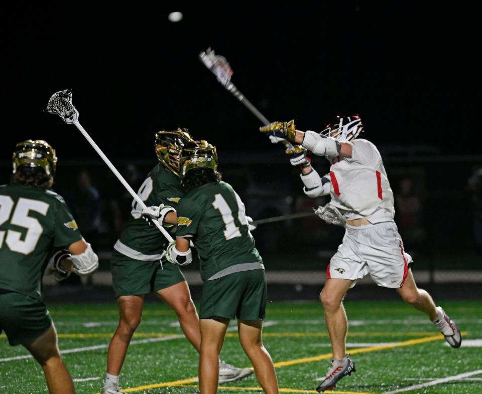 Cardinal Mooney Catholic's Sean Laureano scores against Saint Stephen's Episcopal during a Class 1A-District 11 championship game Thursday evening, April 13, 2023, at Austin Smithers Stadium at John Heath Field at Cardinal Mooney Catholic High School in Sarasota.