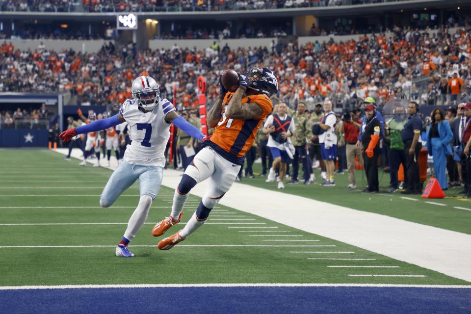 Dallas Cowboys cornerback Trevon Diggs (7) defends as Denver Broncos wide receiver Tim Patrick (81) catches a touchdown. (AP Photo/Michael Ainsworth)