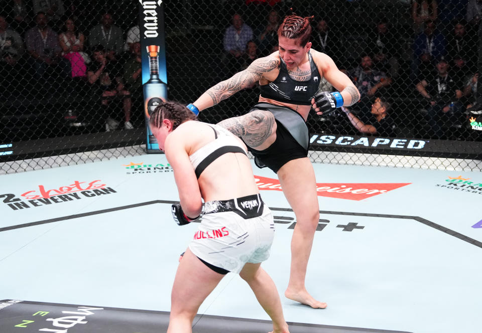 LAS VEGAS, NEVADA – APRIL 06: (R-L) Nora Cornolle of France kicks Melissa Mullins of England in a bantamweight fight during the UFC Fight Night event at UFC APEX on April 06, 2024 in Las Vegas, Nevada. (Photo by Jeff Bottari/Zuffa LLC via Getty Images)