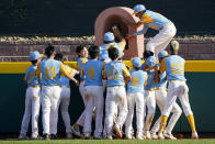 Members of the Honolulu Little League team celebrate their Little League World Series Championship win against Curacao in a Little League World Series Championship baseball game in South Williamsport, Pa., Sunday, Aug. 28, 2022. Honolulu won 13-3. (AP Photo/Tom E. Puskar)