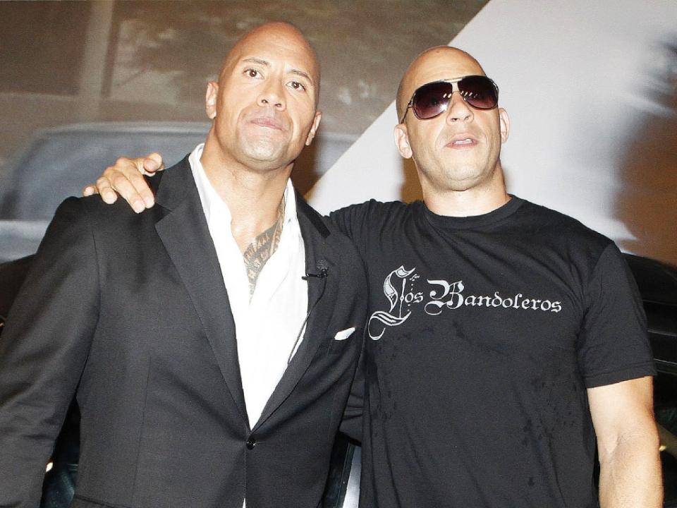 Dwayne Johnson and Vin Diesel at a ‘Fast Five’ premiere in 2011 (Broadimage/Shutterstock)