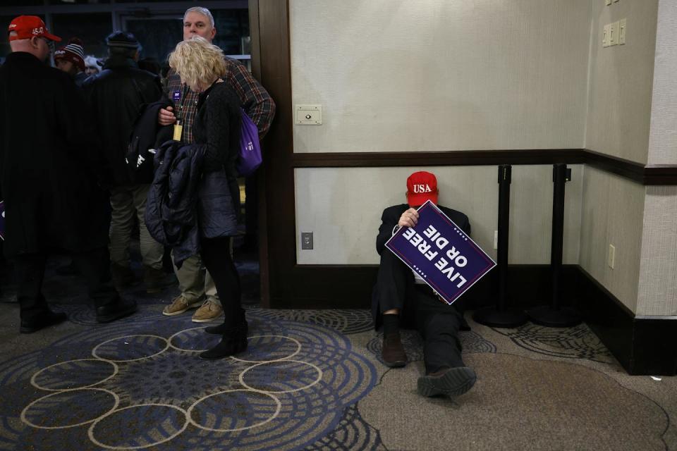 Supporters of Republican presidential candidate Donald Trump leave a campaign rally in Portsmouth, N.H., on Jan. 17, 2024. <a href="https://www.gettyimages.com/detail/news-photo/supporters-of-republican-presidential-candidate-and-former-news-photo/1941350554?adppopup=true" rel="nofollow noopener" target="_blank" data-ylk="slk:Chip Somodevilla/Getty Images;elm:context_link;itc:0;sec:content-canvas" class="link ">Chip Somodevilla/Getty Images</a>