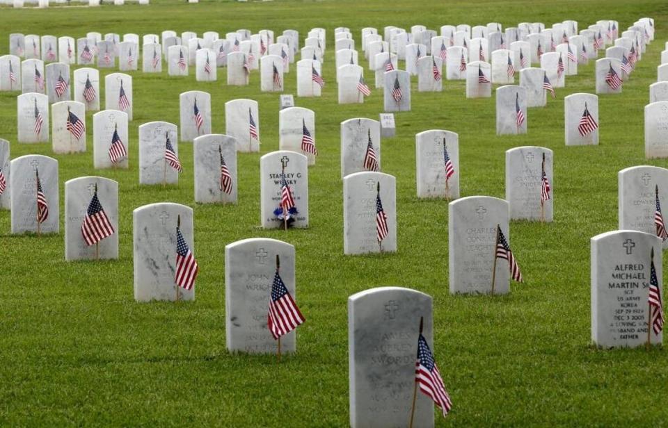 Every grave has a U.S. flag for Memorial Day at the Biloxi National Cemetery. Volunteers place the flags and return after Memorial Day to store them.