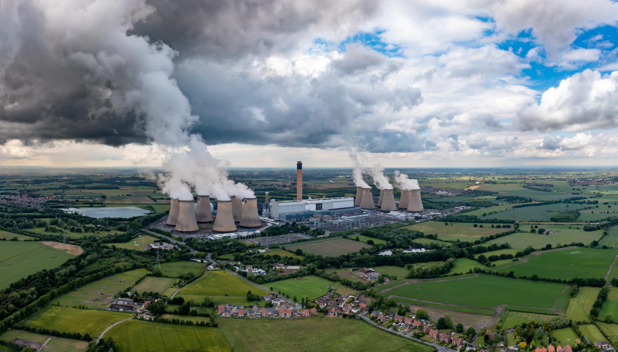 An aerial landscape view of Drax Power Station in North Yorkshire emitting carbon dioxide pollution into the atmosphere