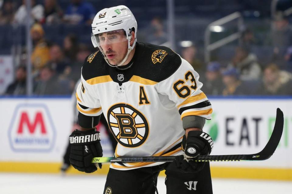 Boston Bruins left wing Brad Marchand (63) looks on during the first period of an NHL hockey game against the Buffalo Sabres on Wednesday, Nov. 24, 2021, in Buffalo, N.Y. (AP Photo/Joshua Bessex)