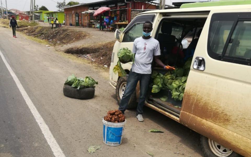 Douglas Kiktru selling vegetables from his van - Douglas Kikutu