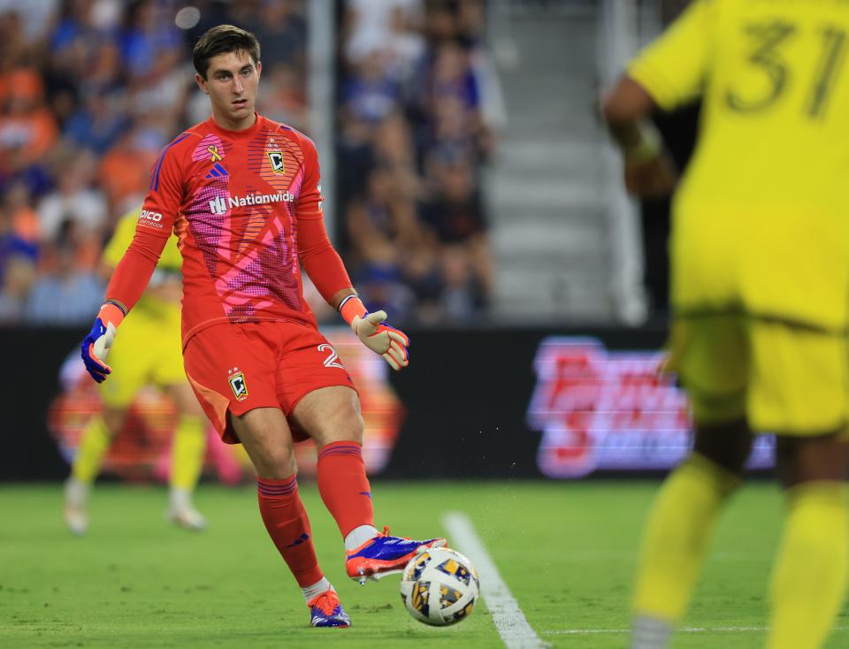 Sep 14, 2024; Cincinnati, Ohio, USA; Columbus Crew goalkeeper Patrick Schulte (28) clears the ball during the first half against FC Cincinnati at TQL Stadium. Mandatory Credit: Katie Stratman-Imagn Images