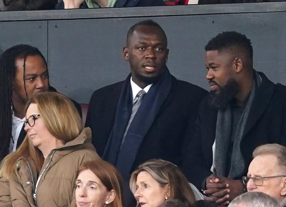 Usain Bolt watches on as Manchester United defeat Fulham in the FA Cup  (PA)