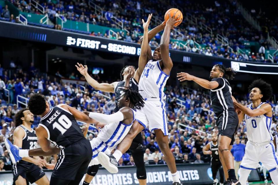 Kentucky forward Oscar Tshiebwe (34) gets a offensive rebound against Providence during an NCAA Tournament first-round game at the Greensboro Coliseum in Greensboro, N.C., on Friday.