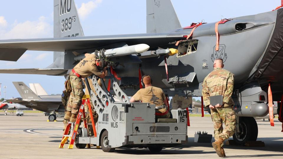 366th FW weapons loaders in action at William Tell. <em>James Deboer</em>