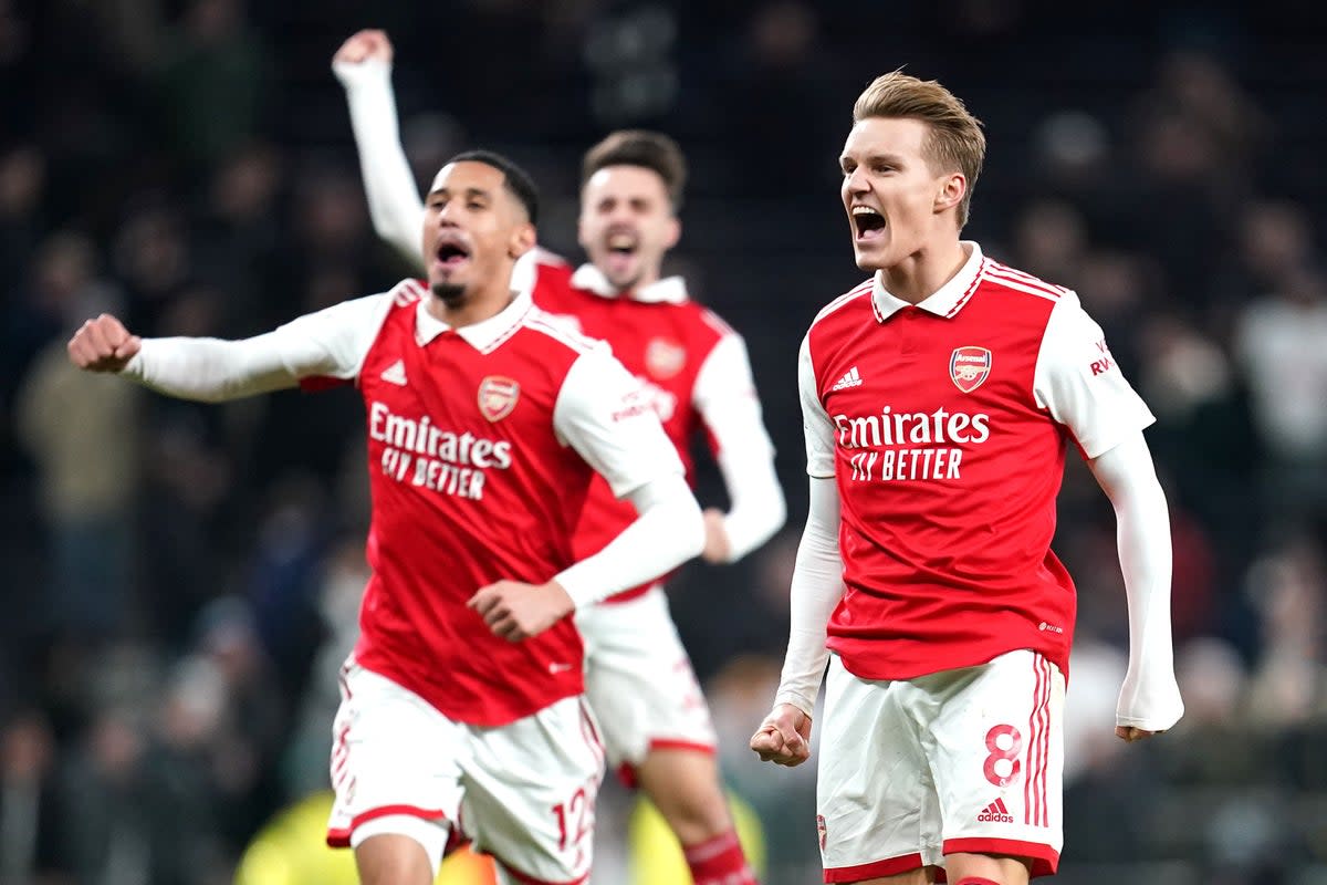 Martin Odegaard (right) celebrates in front of the away fans (Nick Potts/PA) (PA Wire)