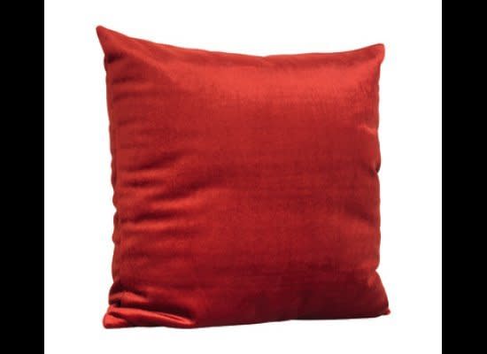 If you have a neutral-toned couch, get a handful of <a href="http://www.officemax.com/clearance/clearance-furniture-seating-and-office-decor/product-prod3790036" target="_hplink">this pillow</a> and pile it on to the sofa to make it really stand out. 