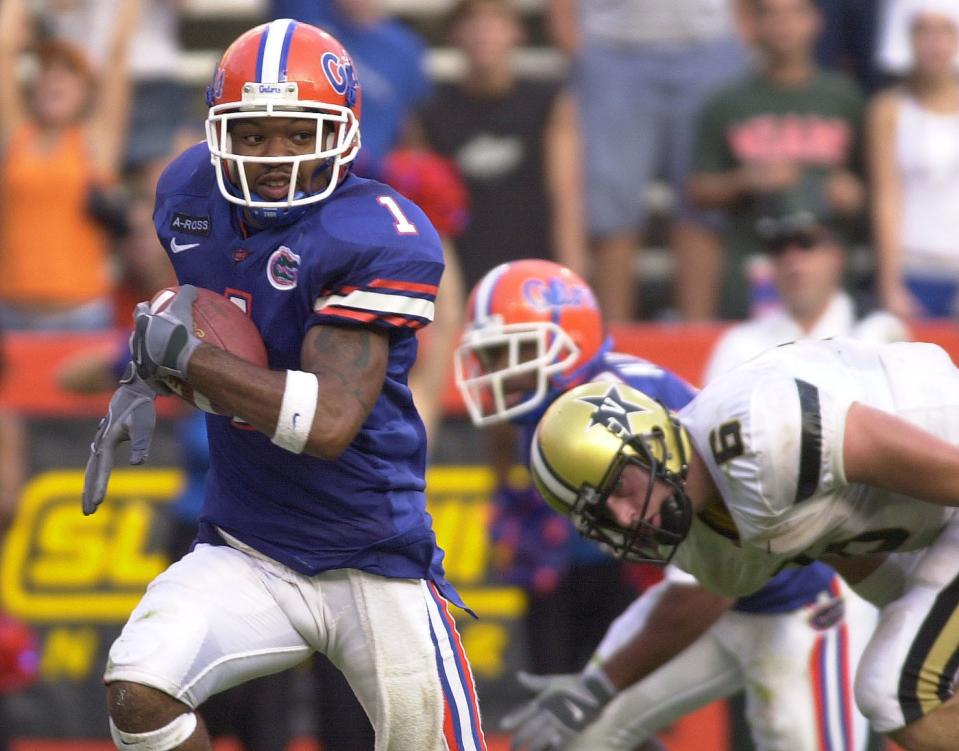 ###Sports### Gators #1 Keiwan Ratliff leaves Vanderbilt's quaterback #6 Jay Cutler in the dust and sprints into the endzone for a touchdown after intercepting his pass for the final score of the game in fourth quarter action at Florida Field in Gainesville, Fl on Saturday November 8, 2003. Florida beat Vandy at homecoming 35-17.