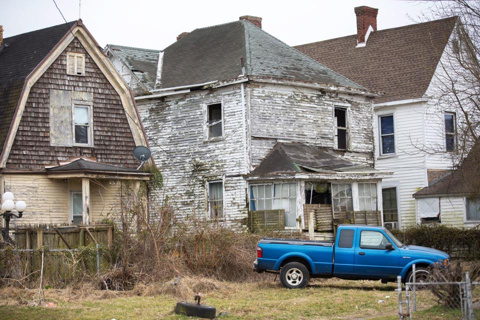 A low income neighborhood in Portsmouth, Ohio. Several of the homes are abandoned and boarded up.