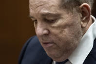 FILE - Former film producer Harvey Weinstein appears in court at the Clara Shortridge Foltz Criminal Justice Center in Los Angeles, Calif., on Oct. 4 2022. Opening statements are set to begin Monday in the disgraced movie mogul Harvey Weinstein's Los Angeles rape and sexual assault trial. Weinstein is already serving a 23-year-old sentence for a conviction in New York. (Etienne Laurent/Pool Photo via AP, File)