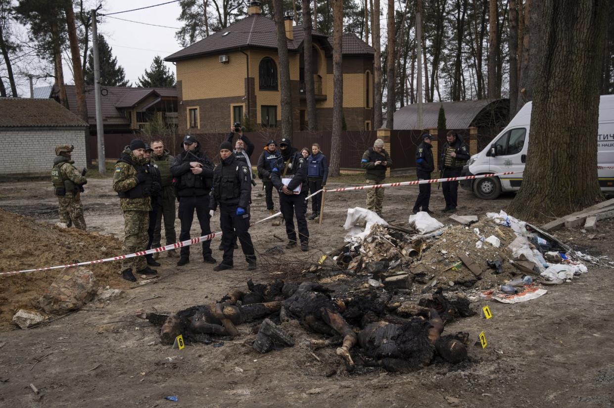 <span class="caption">Rapes, torture and killings have all been reported from Bucha, Ukraine, where soldiers and investigators look at charred bodies lying on the ground.</span> <span class="attribution"><a class="link " href="https://newsroom.ap.org/detail/RussiaUkraineWar/47a0d9425a2a4982a010bbb8f06bb1a2/photo?Query=bucha%20bodies&mediaType=photo&sortBy=arrivaldatetime:desc&dateRange=Anytime&totalCount=109&currentItemNo=22" rel="nofollow noopener" target="_blank" data-ylk="slk:AP Photo/Rodrigo Abd;elm:context_link;itc:0;sec:content-canvas">AP Photo/Rodrigo Abd</a></span>