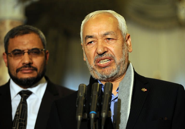 Islamist ruling Ennahda party leader Rached Ghannouchi speaks to the press following his meeting with Tunisian President Moncef Marzouki on February 20, 2013, at the Carthage palace in Tunis. Ghannouchi said "numerous parties have expressed their desire to be part of" a new government