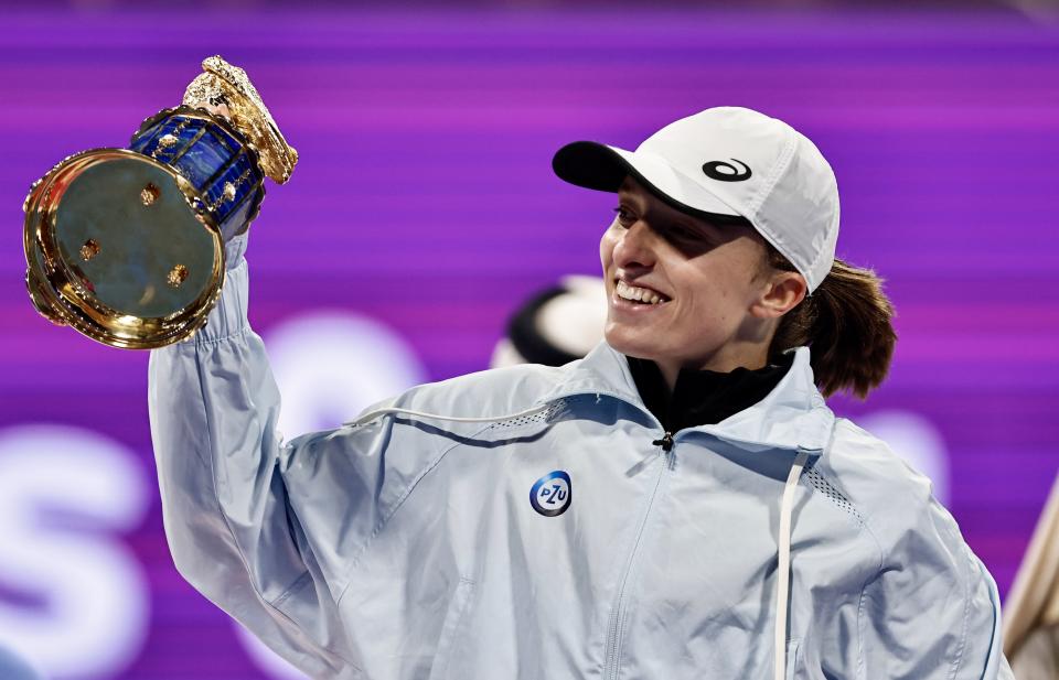 Seen here, Iga Swiatek celebrating with the trophy after defeating Jessica Pegula in the final of the Qatar Open.