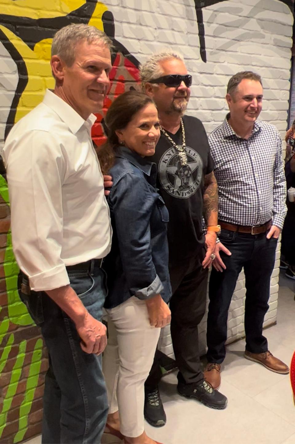 Tennessee Governer Bill Lee and First Lady Maria Lee, Guy Fieri and Bucky Mabe, CEO, FACE at Chicken Guy! Nashville on May 4, 2022.